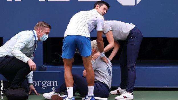 Novak Djokovic apologises after hitting line judge with ball at US Open