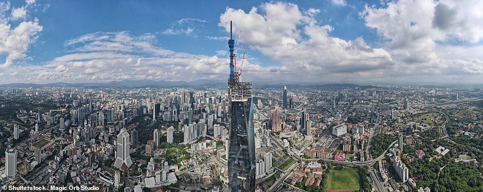 The world's second-tallest building, a 118 storey skyscraper 2,227ft tall is now complete (Photos)