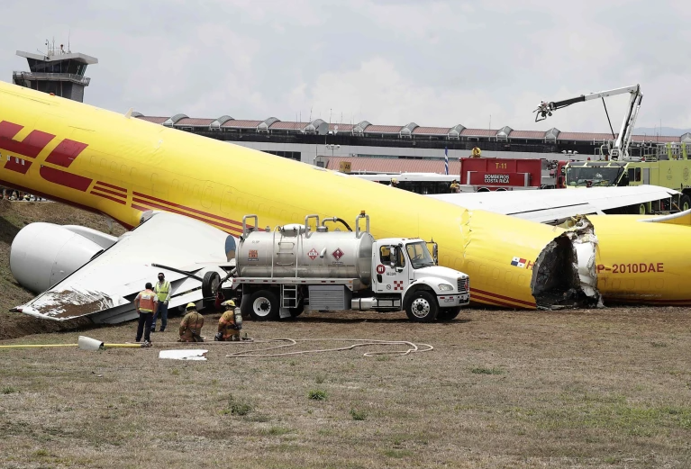 Plane snaps in half after sliding off runway during landing (video)