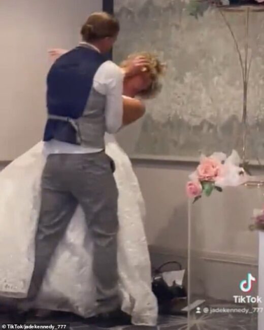 Shocking moment groom smashes wedding cake into bride's face