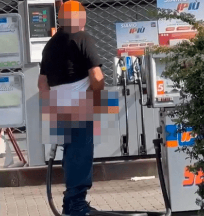 Man caught shoving the nozzle from a petrol pump up his bum while stroking his member at petrol station (+18 video)